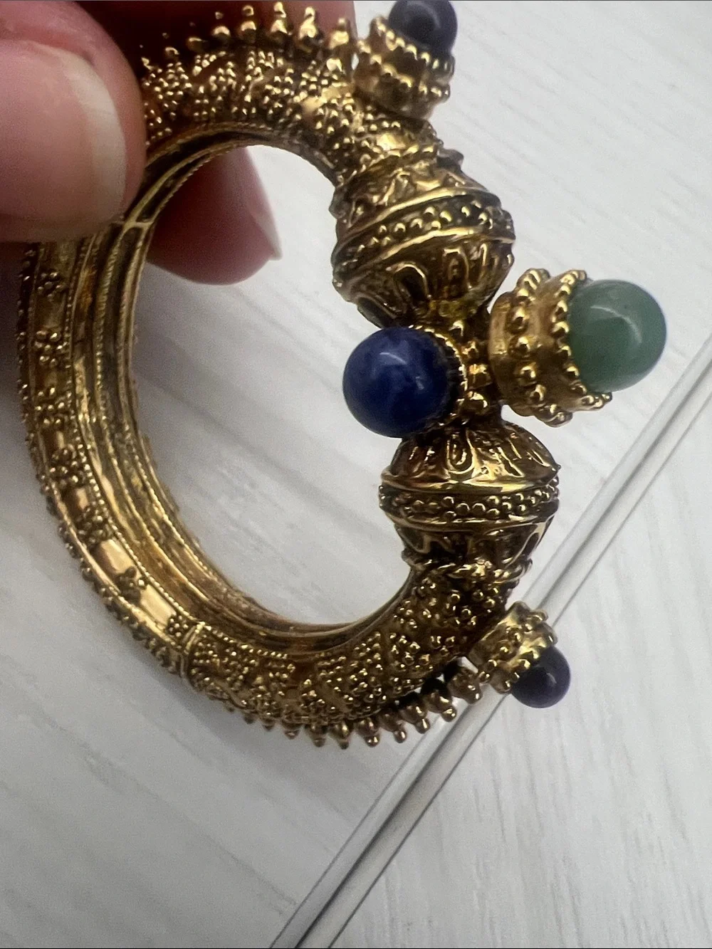 Gold-Tone Textured Hinged Bangle with Blue & Green Cabochons